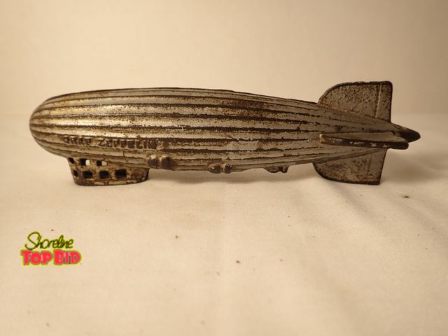 Lot 59-20064 - Antique 1920s Cast Iron "Graf Zeppelin" Still Coin Bank by A.C> Williams, circa 1920s-1930s. Est....