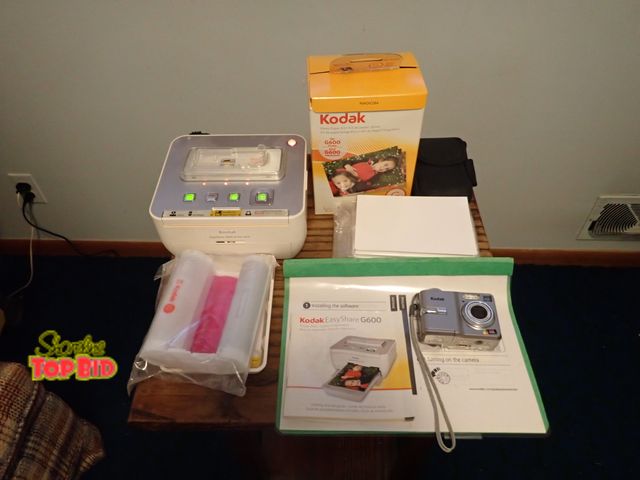 Lot 59-43495 - Kodak Easy Share G600 Printer Dock Station, Kodak Camera Case and Kodak Photo Paper with Instruction...