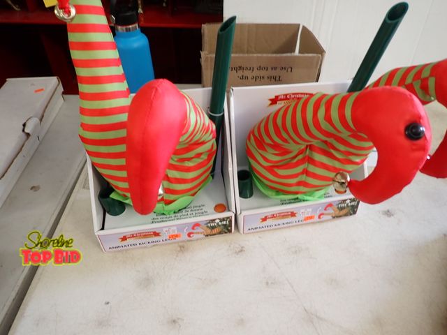 Lot 59-21108 - 2 Animated Kicking Legs. Benefits YMCA Camp Pendalouan