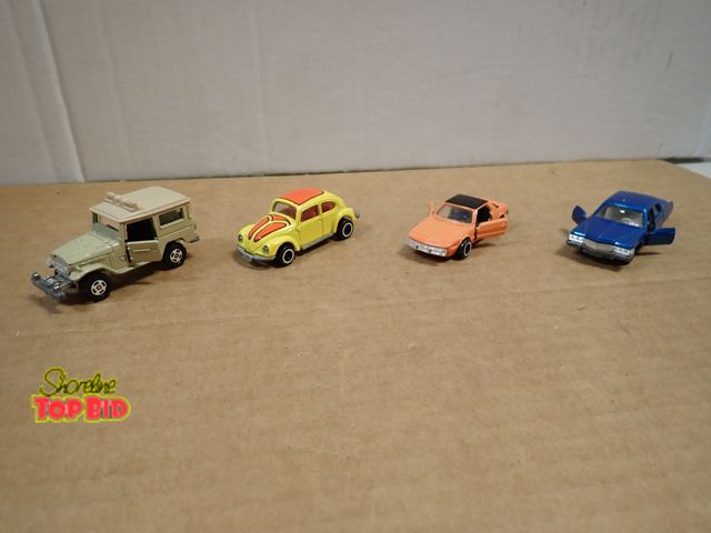 Lot 59-24122 - 4 Vintage Tomica Collector Cars