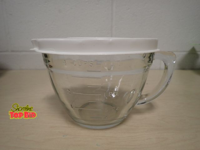 Lot 59-33012 - Pampered Chef 1-quart Glass Measuring and Mixing Bowl with Pour Spout, handle and a white plastic li...
