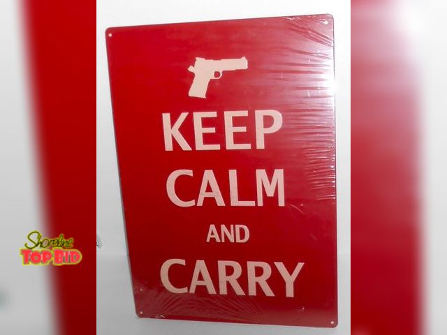 Lot 59-74238 - New Metal Keep Calm and Carry Sign. Measures 16.75" X 12" in original packaging.