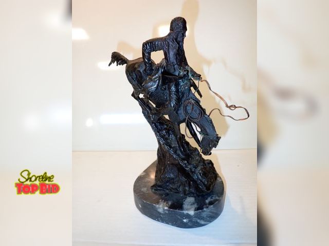 Lot 59-13032 - 9 1/2" Bronze Sculpture Unsigned by Fredric Remington Called "The Mountain Man", a top a marble base