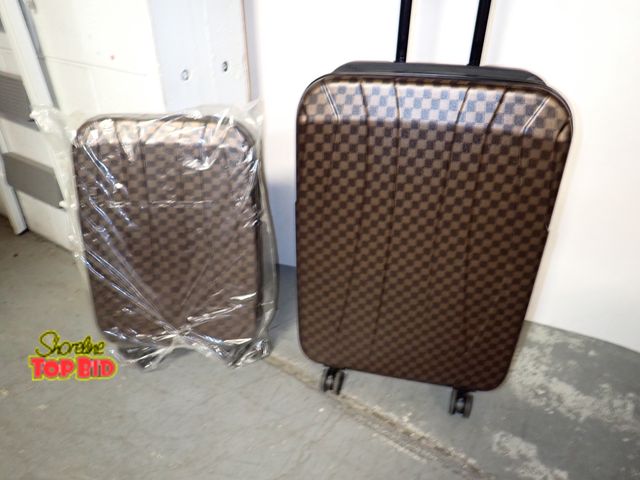 Lot 59-13076 - New Never Used Pair of Suitcases with Wheels and Pull Up Locking Handle for Easier Mobility. Has bui...