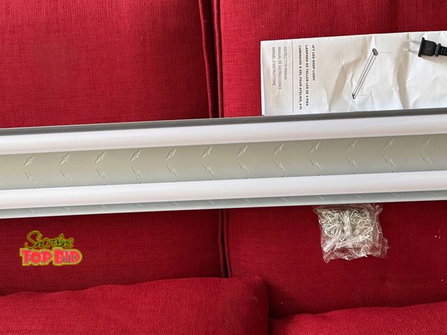 Lot 59-43526 - LED 4 foot Shop Light. NEW IN NEVER OPENED box. Plug in and go!