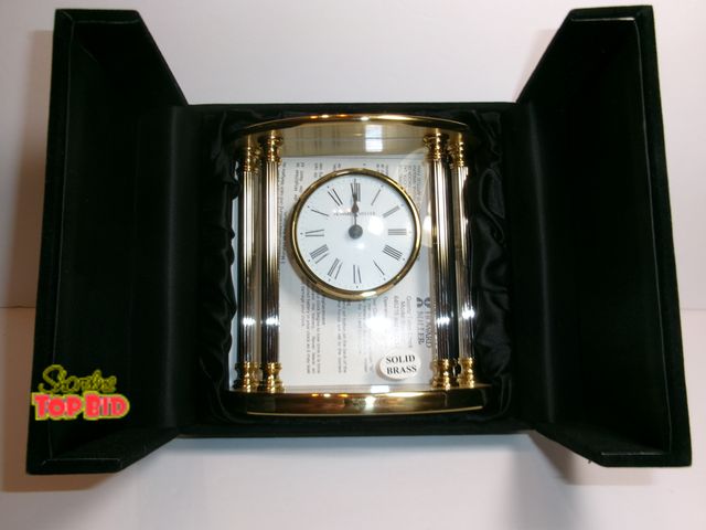 Lot 59-74577 - HOWARD MILLER TABLE/ MANTLE CLOCK 645-217 NEW ORLEANS BRASS - Velvet Presentation Case