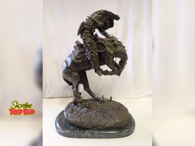 Lot 59-10000 - Signed, Frederic Remington Bronze Sculpture, Titled "Rattlesnake", 23" tall. Estimated value $1,000....