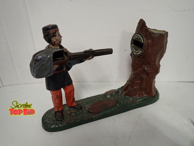 Lot 59-10297 - Original Antique Cast Iron Mechanical Bank, J &amp; E Stevens Creedmore 1877