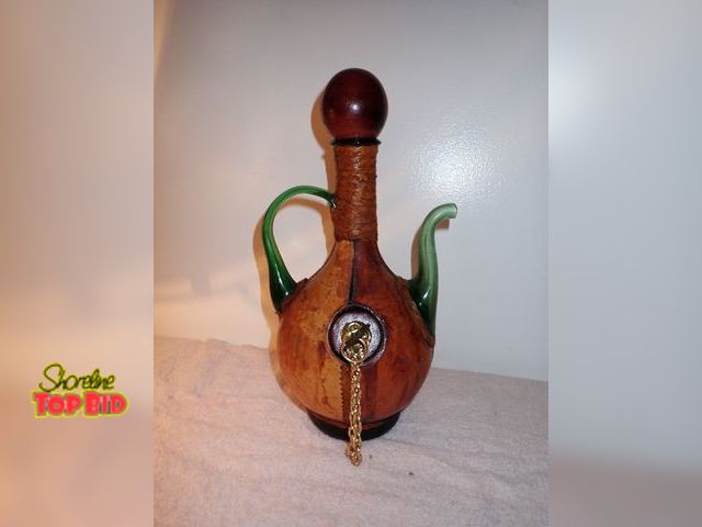 Lot 59-43419 - Vintage Italian Leather-Wrapped Glass Decanter, also known as porron wine pitcher