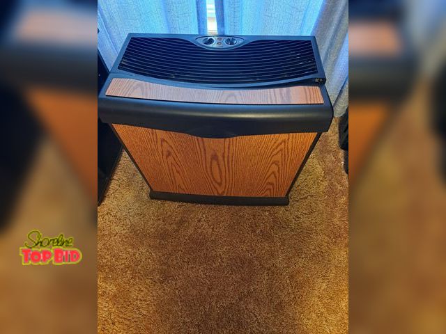 Lot 59-76031 - OFFSITE-Kenmore humidifier on wheels..22" high x 24 1/2" wide x 14" deep...works great..will leave o...