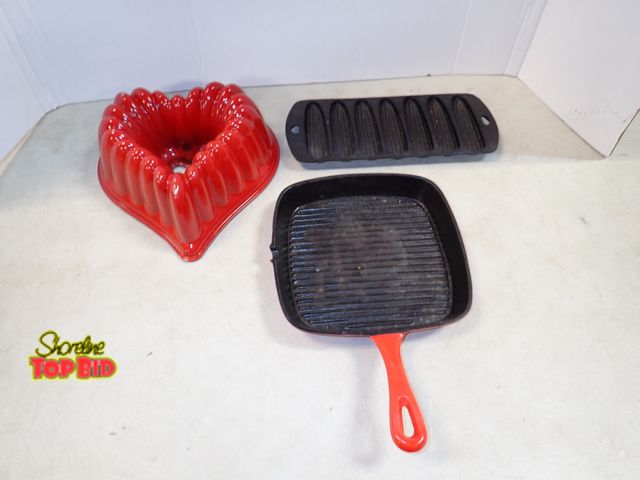 Lot 59-41563 - Cuisinart Red Enamel Cast Iron Grill Pan, Cast Iron Cornbread Pan and Nordic Ware Heart Mold