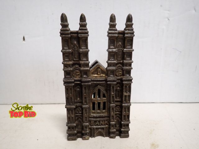 Lot 59-14208 - Antique Cast Iron Still Bank Styled to Look Like Westminister Abbey, early 20th Century by the Briti...