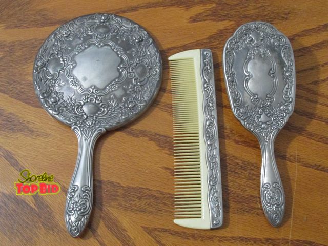 Lot 59-10116 - 3 piece mirror, comb &amp; brush set.  The set have matching designs in a heavyweight silver color m...