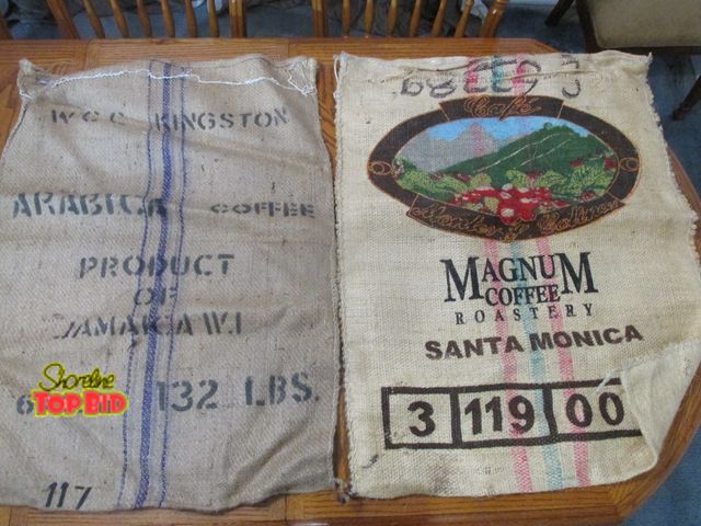 Lot 59-10106 - 2 large burlap coffee bags (empty).  Both are 27"W x 36"T.  One is Kingston Arabica, Product of Jama...