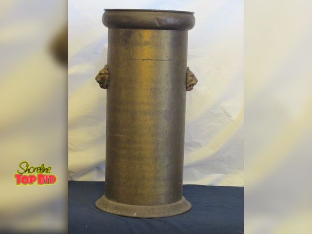 Lot 59-10064 - 21"T brass entryway umbrella holder w/lion faces on the sides.  Good condition, one small dent at to...