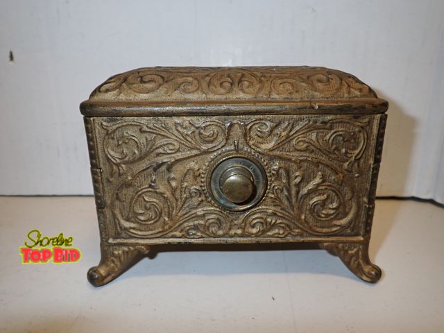Lot 59-14118 - Antique Cast Iron Still Bank by Hart Co. around 1889, intricated embossed patterns, floral or flower...