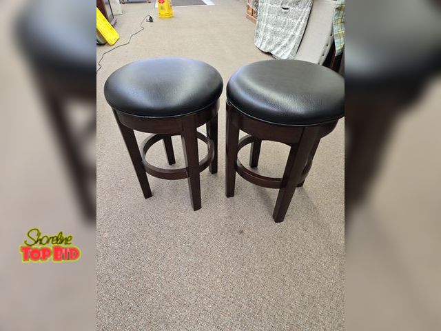 Lot 59-76031 - 2 swivel stools 23 inches tall