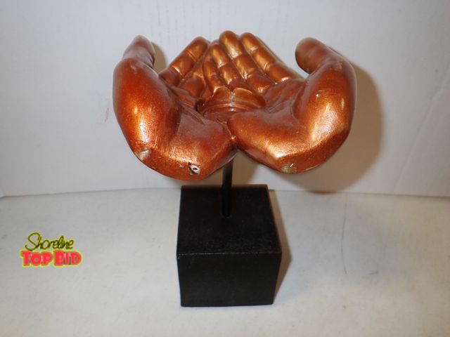 Lot 59-43584 - Hand Tea Light Holder Sculpture