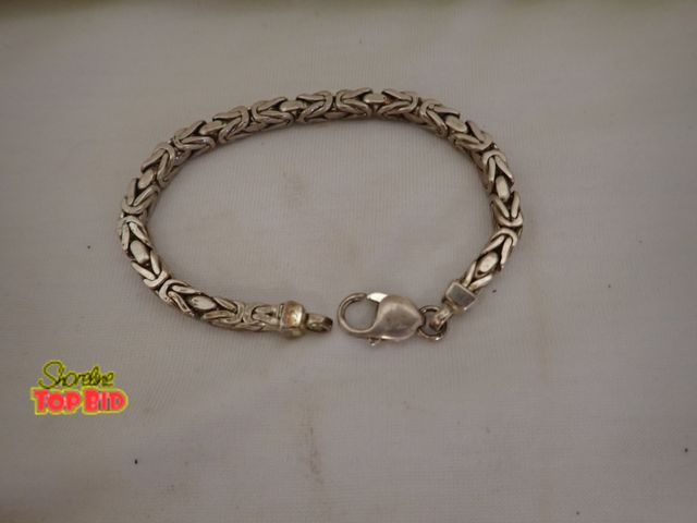 Lot 59-21173 - Sterling Silver Solid Rope Style Bracelet 8" long, 27.08 grams total weight