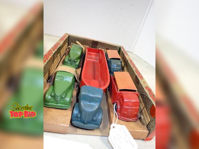 Lot 59-41735 - Auburn rubber toys USA. 2 Trucks, 2Cars, 1 Truck with trailer original as is box