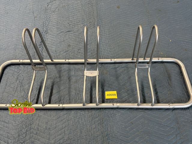 Lot 59-40000 - 3 Bike stand/parking rack.  Adjustable from 1 bike to 3 bikes. Snaps and screws together.