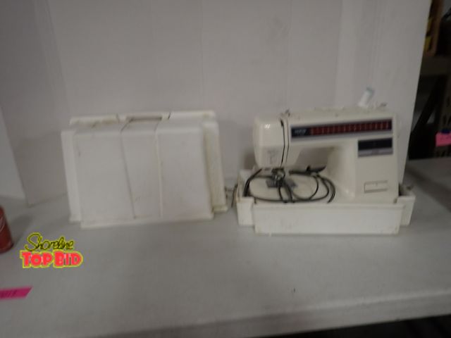Lot 59-50019 - Brother Sewing Machine in Case with Foot Pedal