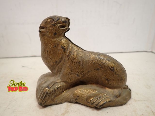 Lot 59-14511 - Antique Cast Iron "Seal on Rock" Still Bank by Arcade Manufacturing Co. from 1910-1913, 3 1/2" tall ...