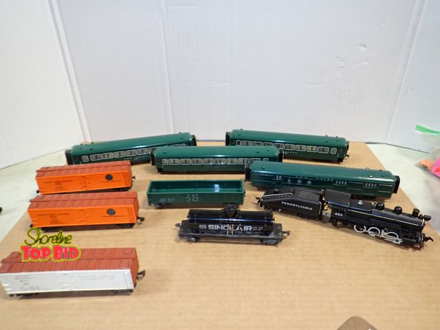 Lot 59-24110 - Early Gilbert American Flyer Tanker Car, Also, 3 New Haven 135 Passenger Cars, 1 New Haven Postal Ca...
