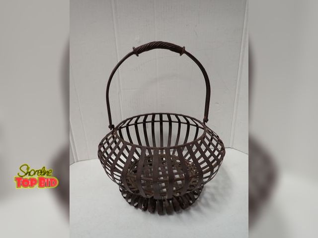 Lot 59-21291 - Rustic Woven Metal Basket, A Rounded Base and High Arched Swing Handle, 17 1/2" tall to top of handl...