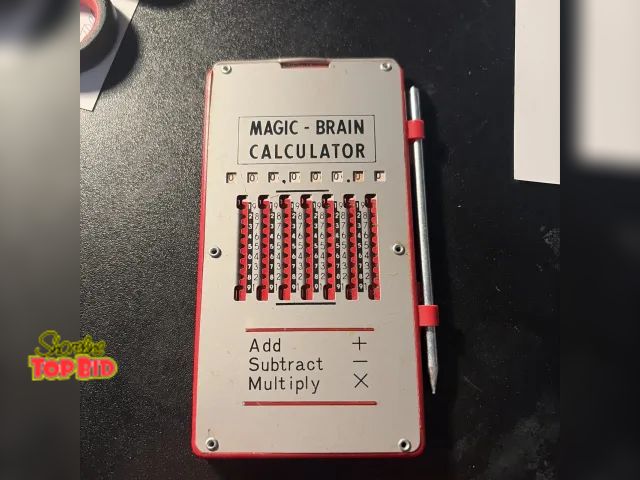 Lot 59-74457 - Vintage Magic-Brain Vintage Handheld Pocket Calculator with Stylus