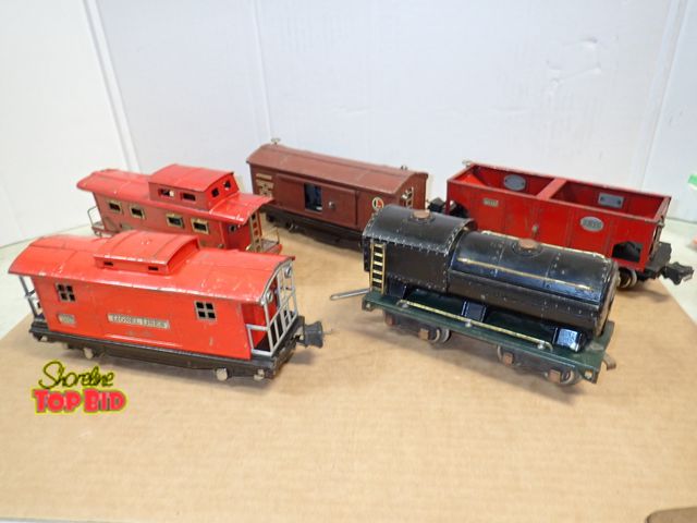 Lot 59-24108 - Lionel Tin Train Set: 3 Cars, 1 Engine, Pre-War Set and 1 American Flyer Caboose