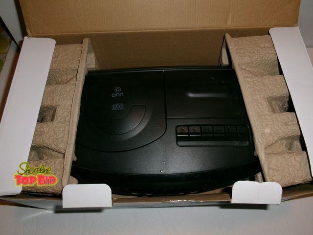 Lot 59-74524 - ONN Portable CD Boombox with Cassette Recorder box. Features Top-loading CD player that plays CD, CD...