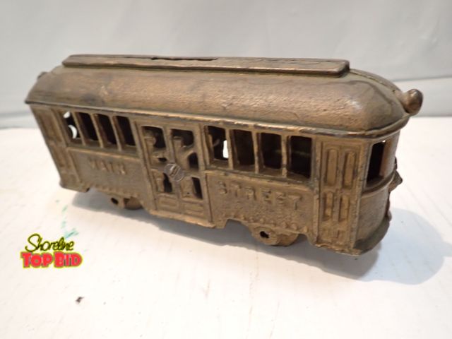 Lot 59-10323 - Antique Cast Iron "Main Street" Trolley Car Still Coin Bank by the A.SC. Williams Co. Circa 1920s 3"...