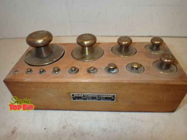 Lot 59-14655 - Ca. 1935 Fisher Scientific Company, Brass Graduated Weight Set with Wood Block Holder. Est Value &am...