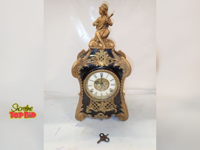 Lot 59-14488 - Ca. 1895 Kroeber "Pompadour Mantel Clock" - front face is loose with key. Working condition unknown....