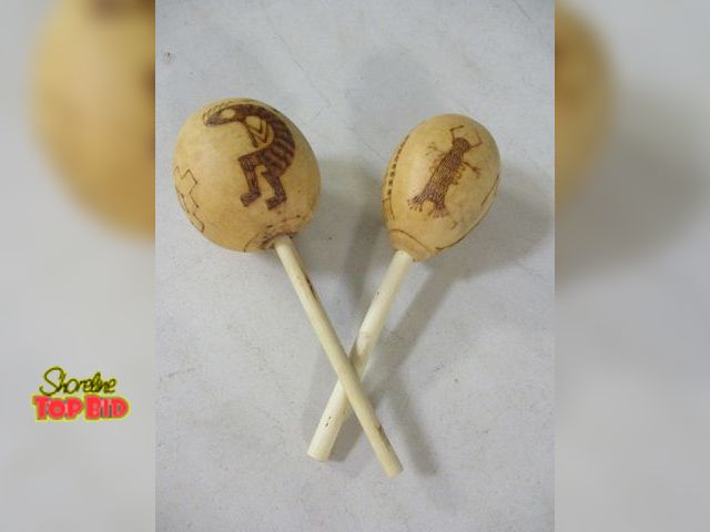 Lot 59-21228 - 2 Hand Carved Native American Gourd Rain Rattles