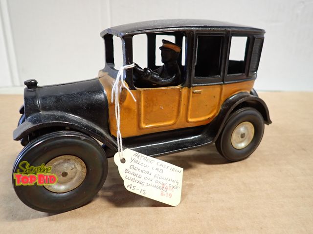 Lot 59-20068 - Cast Iron Arcade Yellow &amp; Black Cab with Brown Running Board