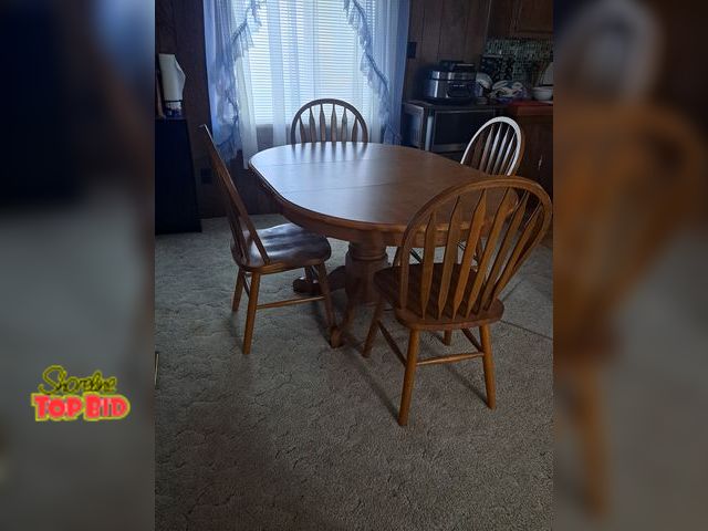 Lot 59-76048 - OFFSITE -Oak dining room table..60" long x 42" wide with leaf in x 30 1/2" tall...solid n heavy with...