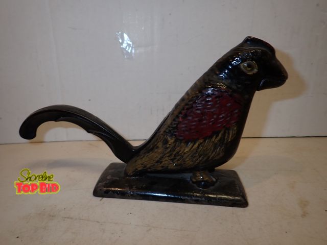 Lot 59-14438 - Ca. 1900-30, England Cast Iron Parrot Nutcracker,  6" tall x 10" long. Estimated value $225.00 to $4...