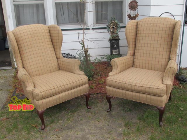 Lot 59-10062 - Set of 2 matching 44"T vintage wingback chairs.  Both chairs are in excellent condition, no rips or ...