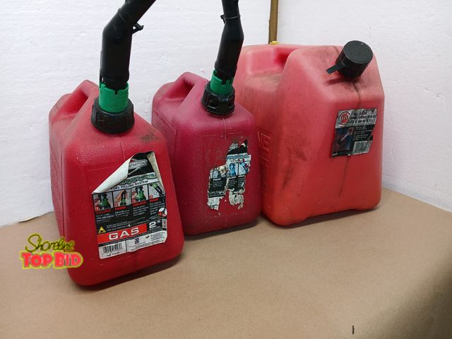 Lot 59-71024 - 3 gas cans 2-2.5 gallon 1 5 gallon
