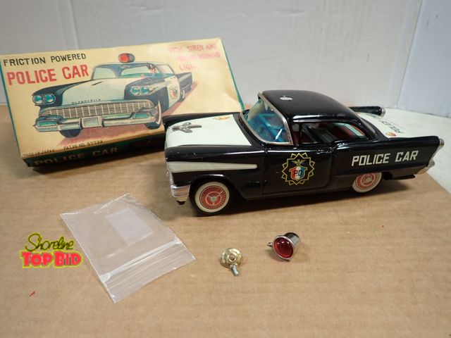 Lot 59-20058 - Tin Friction Powered Police Car with Siren &amp; Original Box