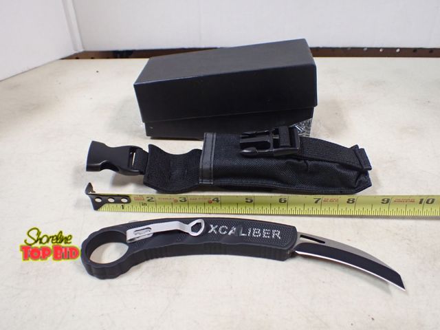 Lot 59-41310 - XCaliber Spring Loaded in &amp; Out New Karambli Knife