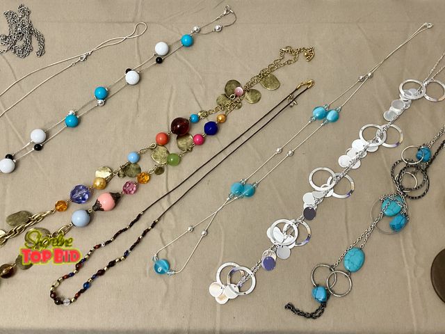 Lot 59-83039 - Lot of 9 longer length necklaces- all in very good condition with no issues.