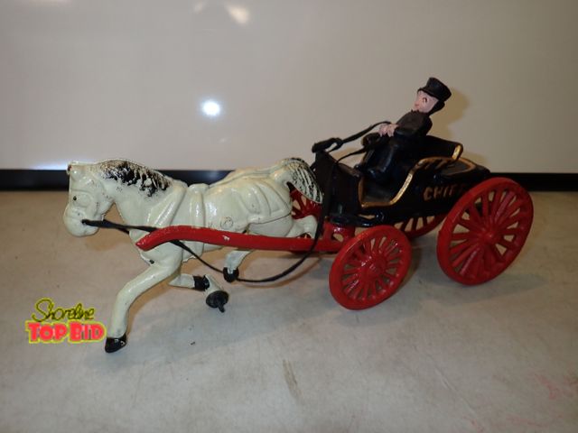 Lot 59-13017 - Vintage Horse Drawn Cast Iron Chief P.D. Wagon 13" long
