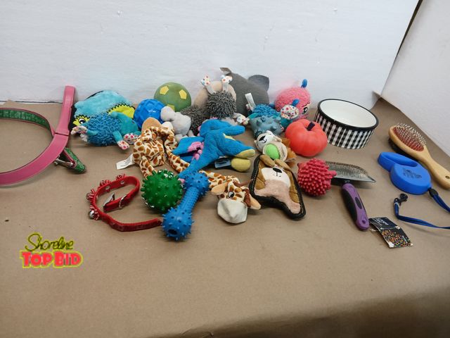 Lot 59-71052 - Dog toys, bowl, leashes, brushes