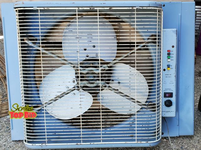 Lot 59-43624 - Vintage Mid Century Lakewood window fan. Multi speed, reversible with automatic thermo control.