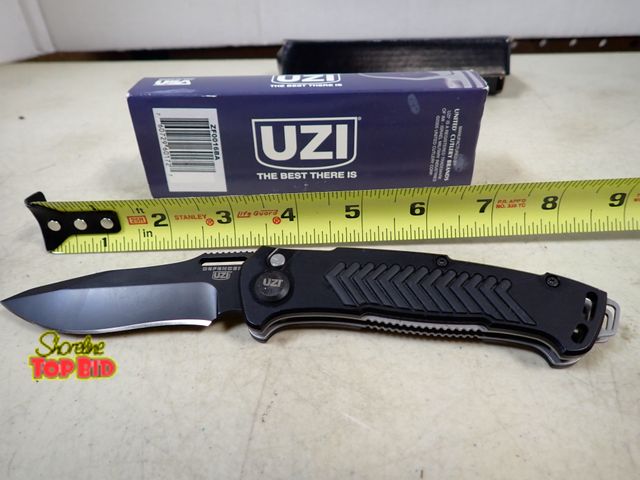 Lot 59-41439 - UZI Defender Custom Spring Action Blade by Fred Caster, New