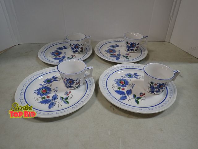 Lot 59-41789 - Japanese 8 piece porcelain 1980's snack plates with cup's by Jonas Roberts called Terra Stone Granad...
