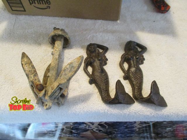 Lot 59-80053 - Mermaids' metal hangers and small fold out anchor